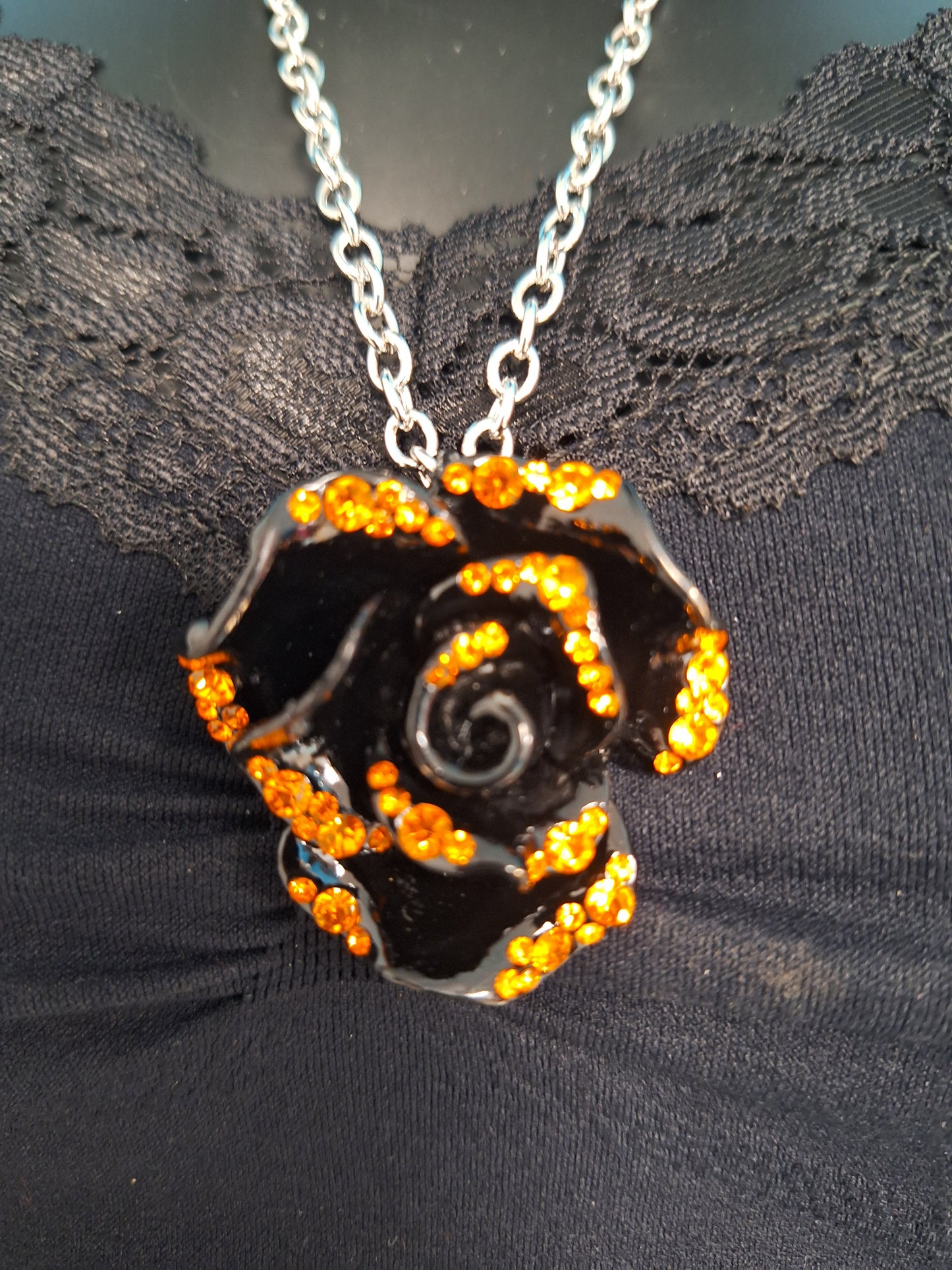 Black Rose with Orange Bling